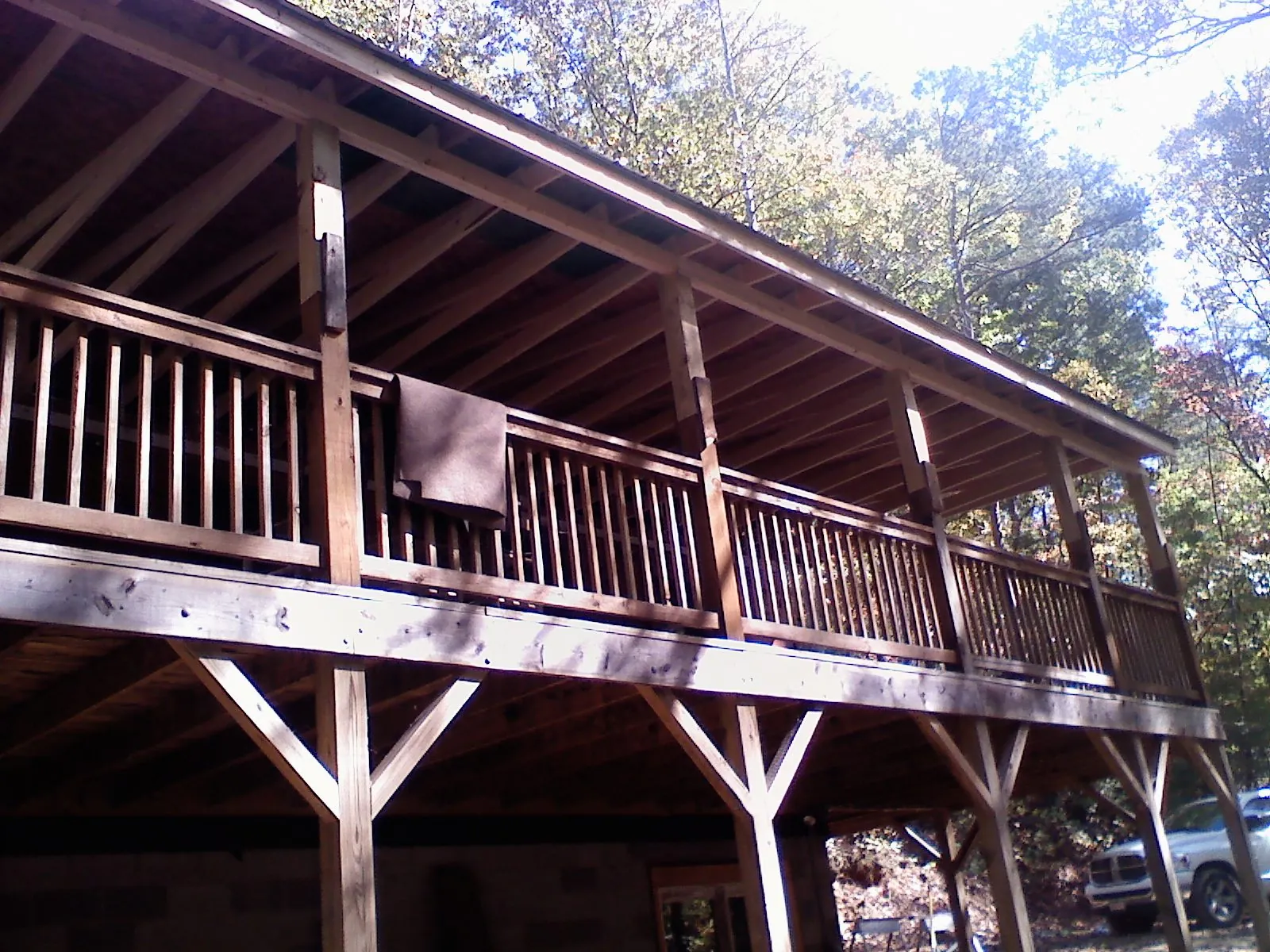 Timber framing under a new elevated porch and deck — Roof Leak Repair in Powell by Roofing Brothers